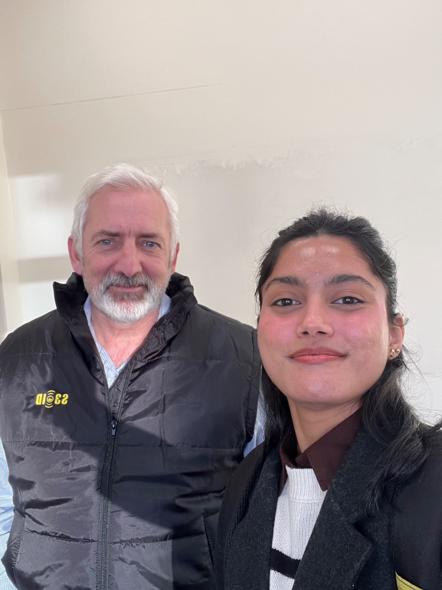 Disha Dhara with an industry leader during an S3 site visit
